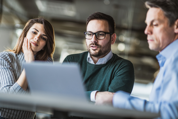 Employees Using AI on Laptop