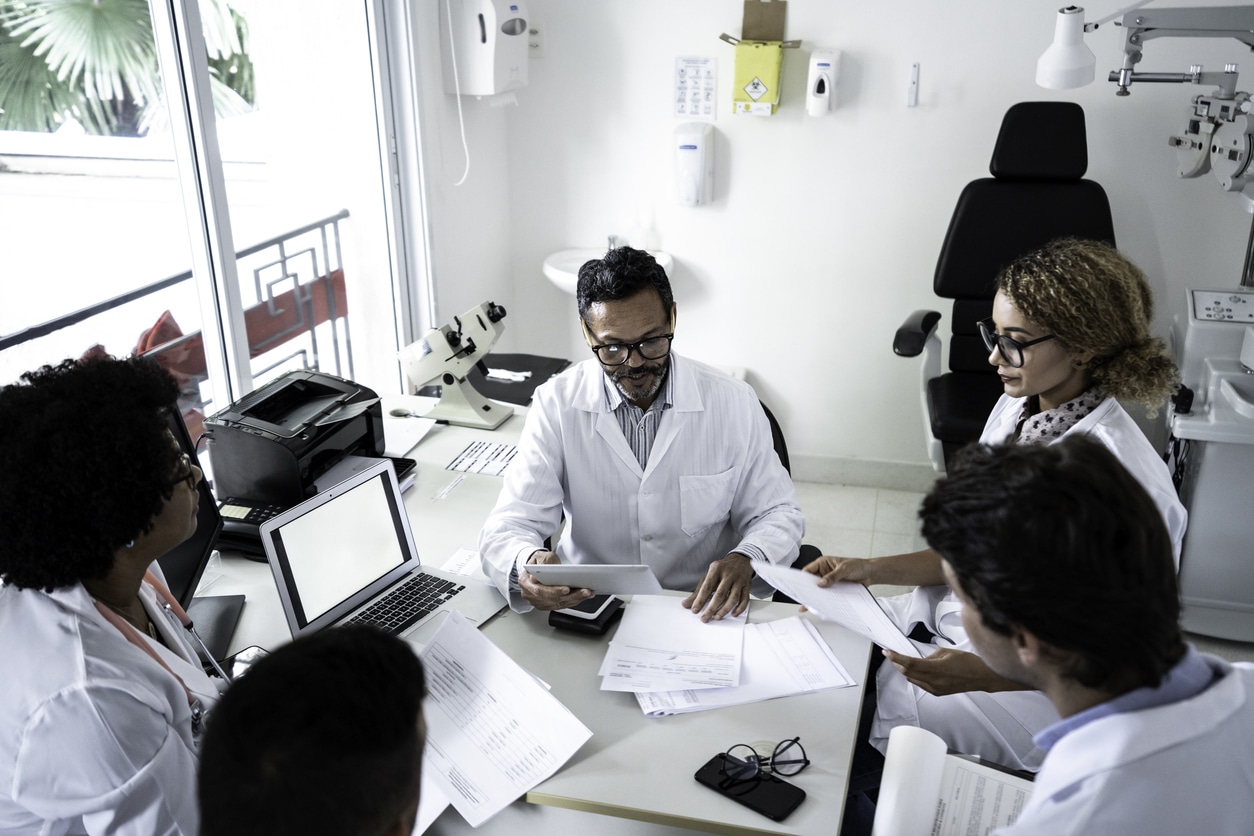 Doctors discusses something during doctor’s conference / meeting